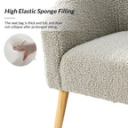 Poltrona a botte in tessuto bouclé salvia / nero / avorio / grigio / blu, seduta singola, gambe in legno massello