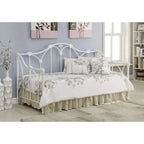 Divano letto singolo in metallo bianco con dettagli floreali